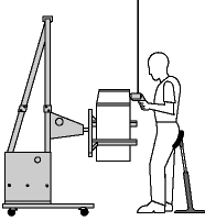 Figure 2a - Des gabarits et des étaux aident à maintenir les objets à la bonne hauteur et dans la bonne position